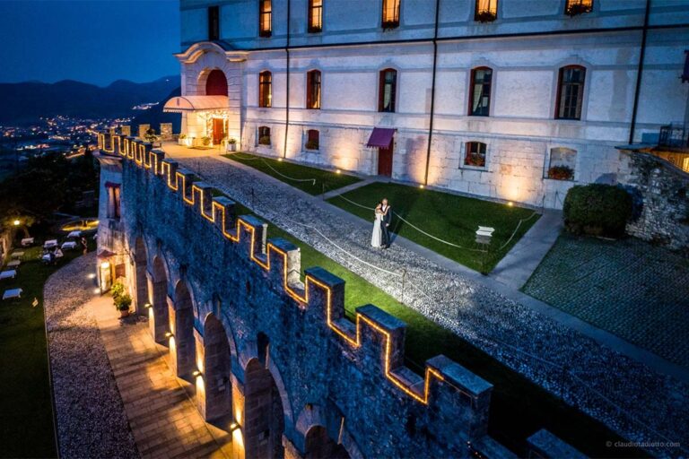 A couple on the castle terrace at dusk, Castel Brando