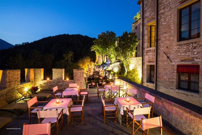 The terrace laid for dinner, Castel Brando