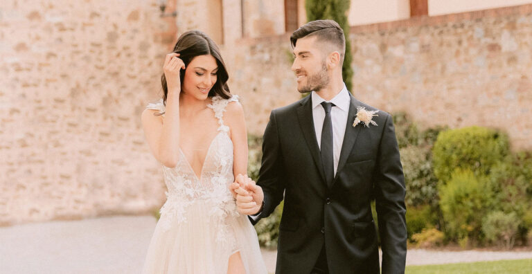 A couple walking in the grounds, Castel Monastero