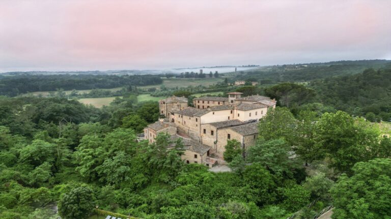 Castel Monastero from above, set in the Tuscan hills, Castel Monastero