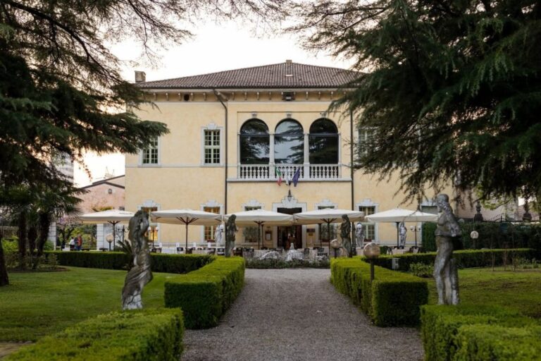 The castle facade and its formal gardens, Castello Bevilacqua