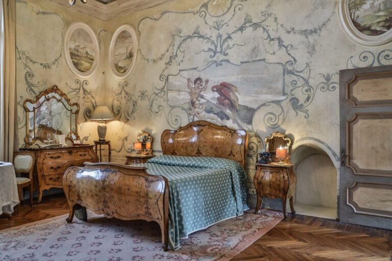 A frescoed junior suite at Castello Bevilacqua, Castello Bevilacqua