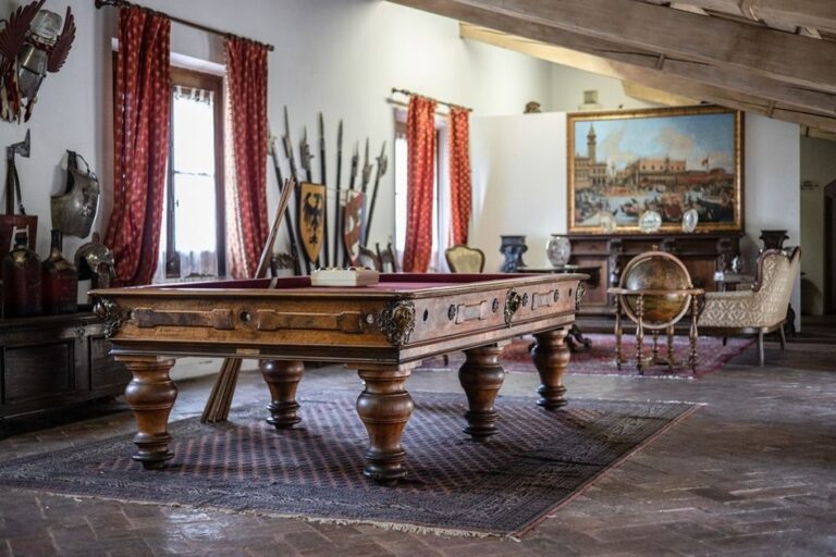 The historic armeria salon with antique armour, Castello Bevilacqua