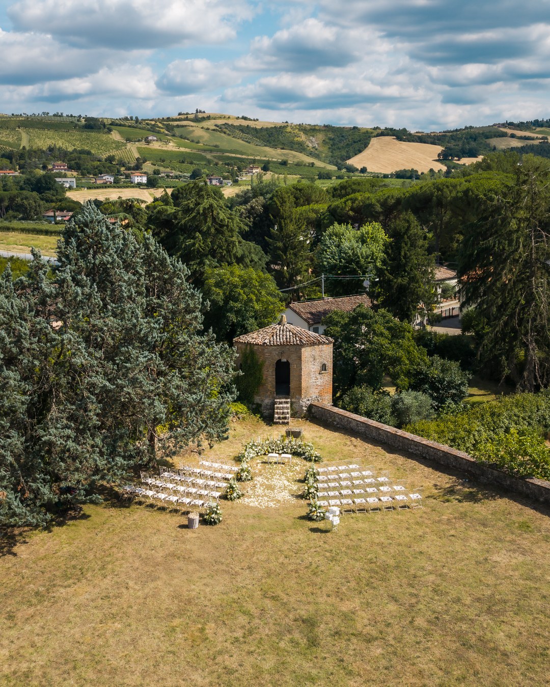 Chairs set out in the park for a ceremony, Castello del Capitano delle Artiglierie
