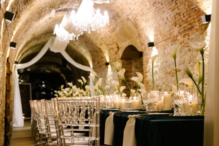 A vaulted hall set for an indoor ceremony, Castello del Capitano delle Artiglierie