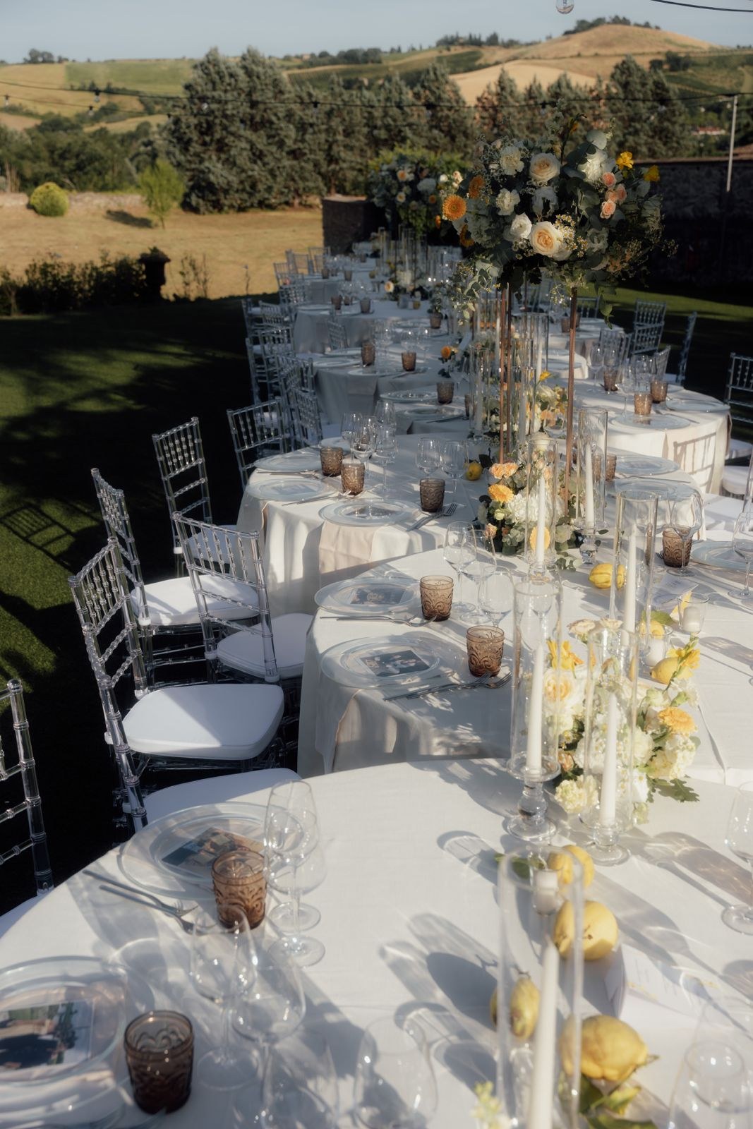 A table laid with glassware and flowers, Castello del Capitano delle Artiglierie