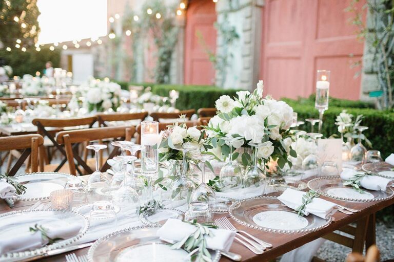 White floral table settings with crystal and candles, Caterina Weddings