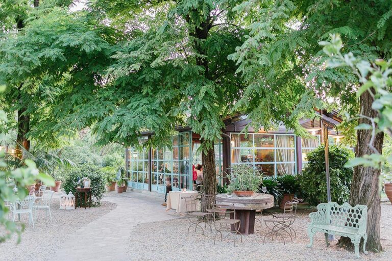 Garden courtyard set for a reception, Caterina Weddings