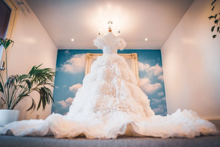 A tiered ruffled couture gown on a mannequin in the Blades studio, Catherine Blades Couture