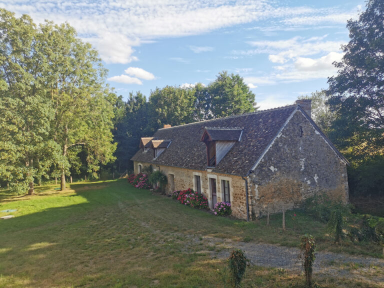 Lawn in front of one of the estate gites, Château de Chéronne