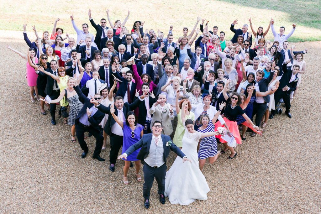 Wedding group photograph taken from above in the courtyard, Château de Chéronne