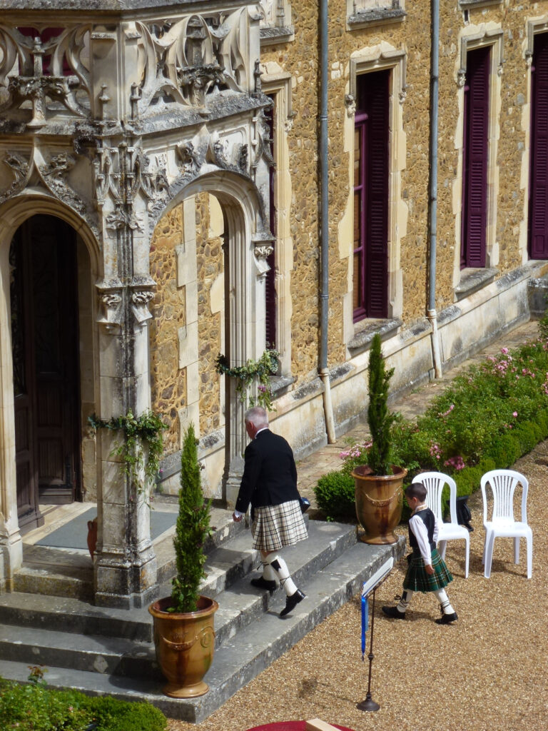 Guests at a reception on the chateau terrace, Château de Chéronne