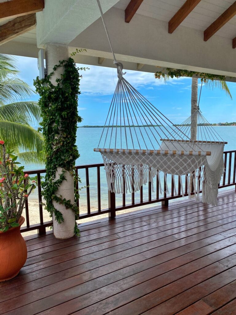 A villa veranda with a hammock and an open view to the sea, Chabil Mar Resort