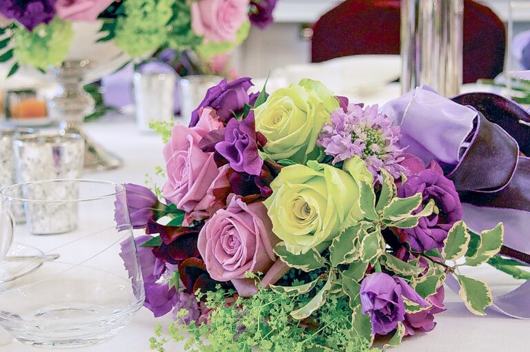 A bouquet of purple roses, lisianthus and lime green accents, Chantal Flores Design