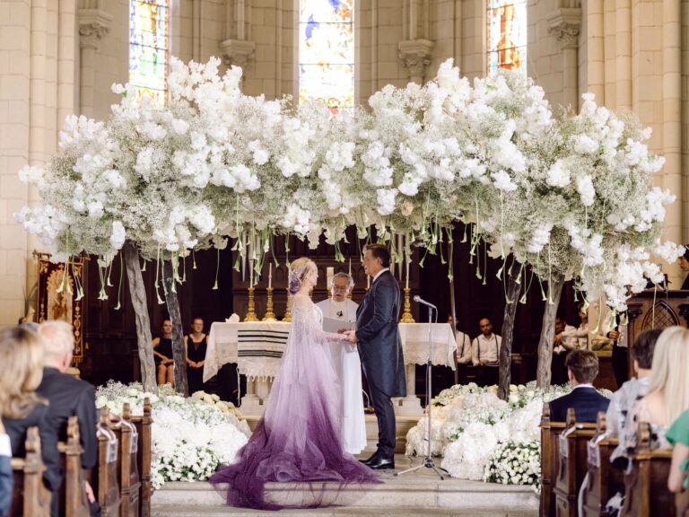 Intimate ceremony beneath a floral canopy, Chateau Challain