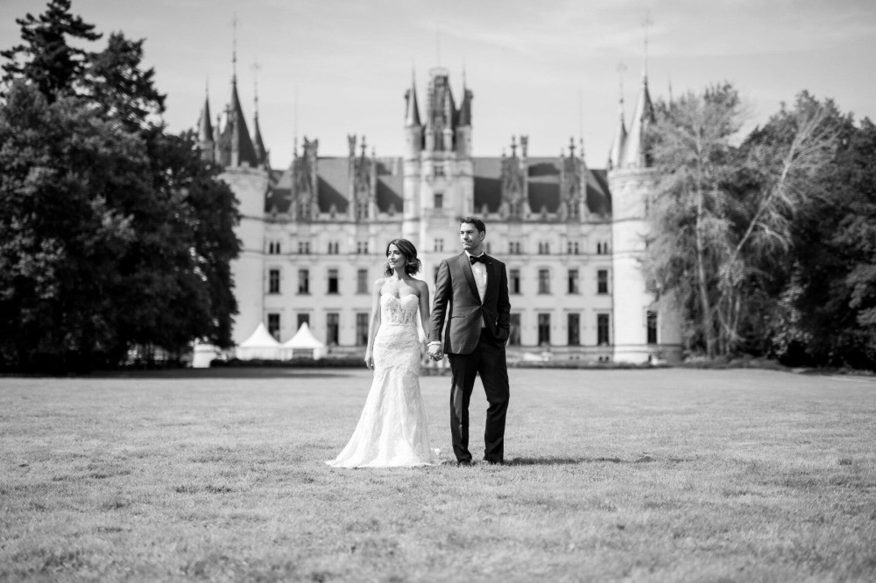 A couple on the front lawn facing the chateau, Chateau Challain