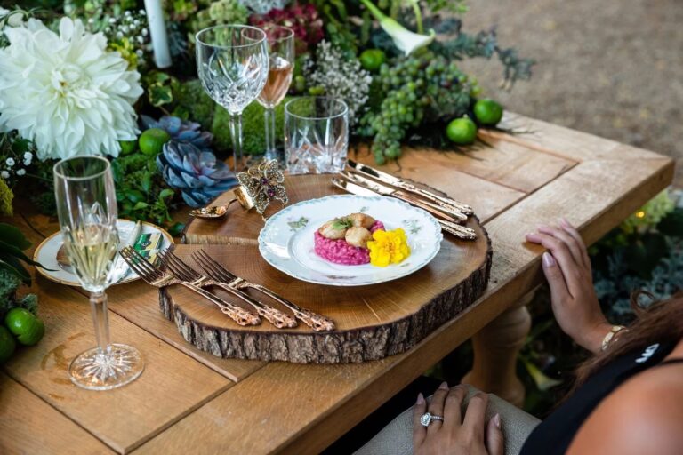 Plated starter with champagne at a garden table, Chateau Challain