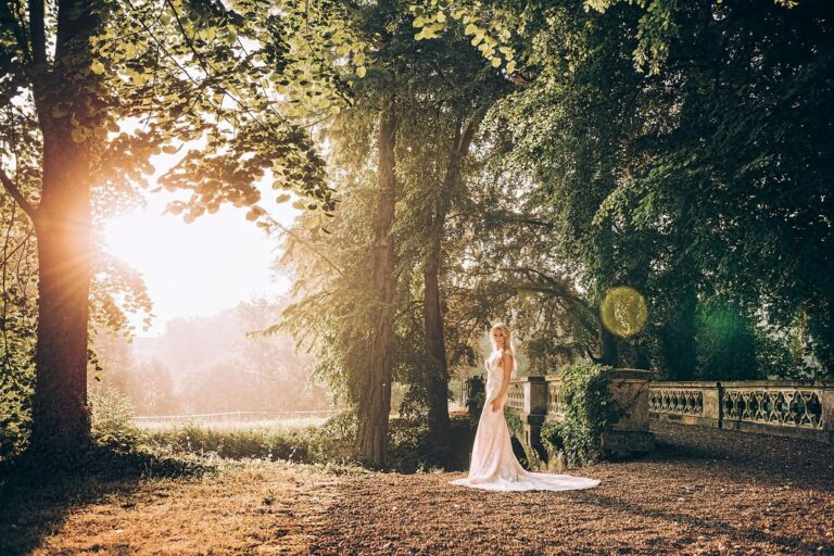 A bride in the sunlit woodland, Chateau Challain