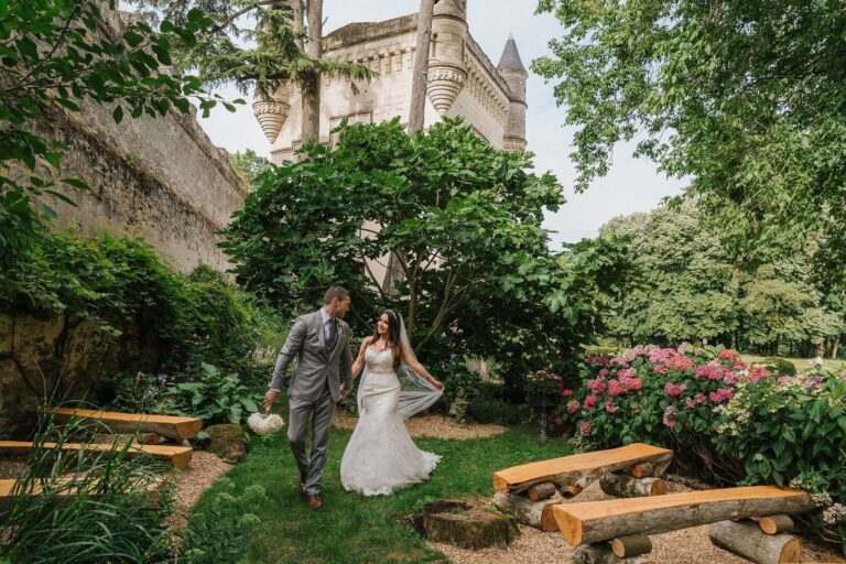 A couple walking through the gardens, Chateau Challain