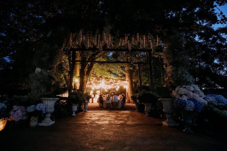 Garden reception lit at night, Chateau Challain