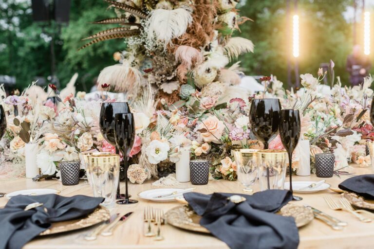Table setting with flowers and black glassware, Chateau Challain