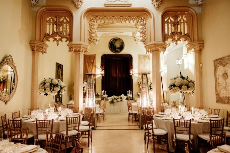 Round tables laid in a chateau hall, Chateau Challain