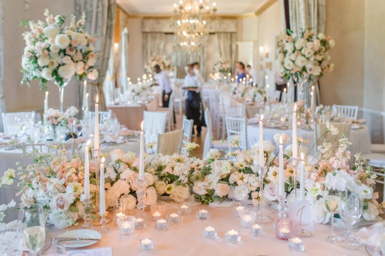 A wedding banquet table dressed with flowers and candles, Chateau Mcely