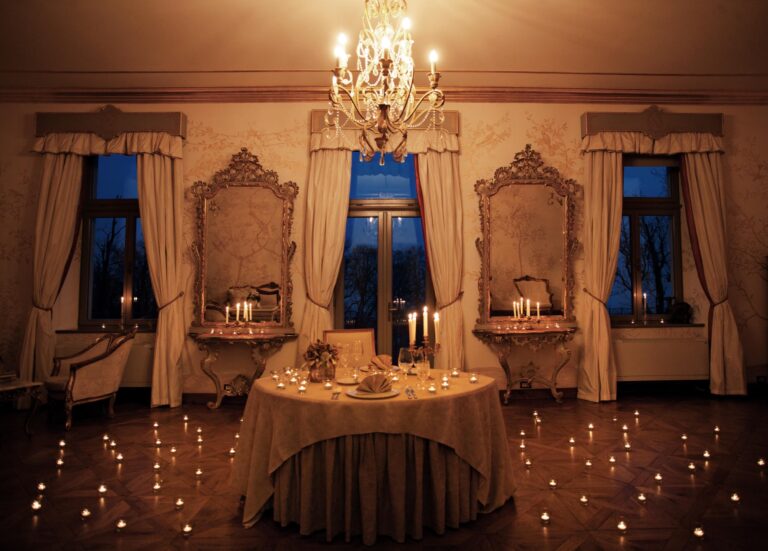 The Golden Hall set for dinner by candlelight, Chateau Mcely
