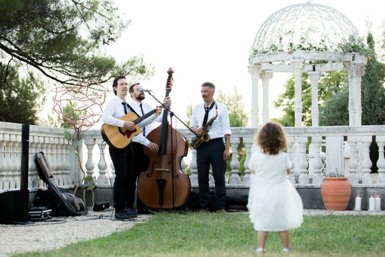 Live musicians playing beside the Temple of Love, Chateau Saint Georges