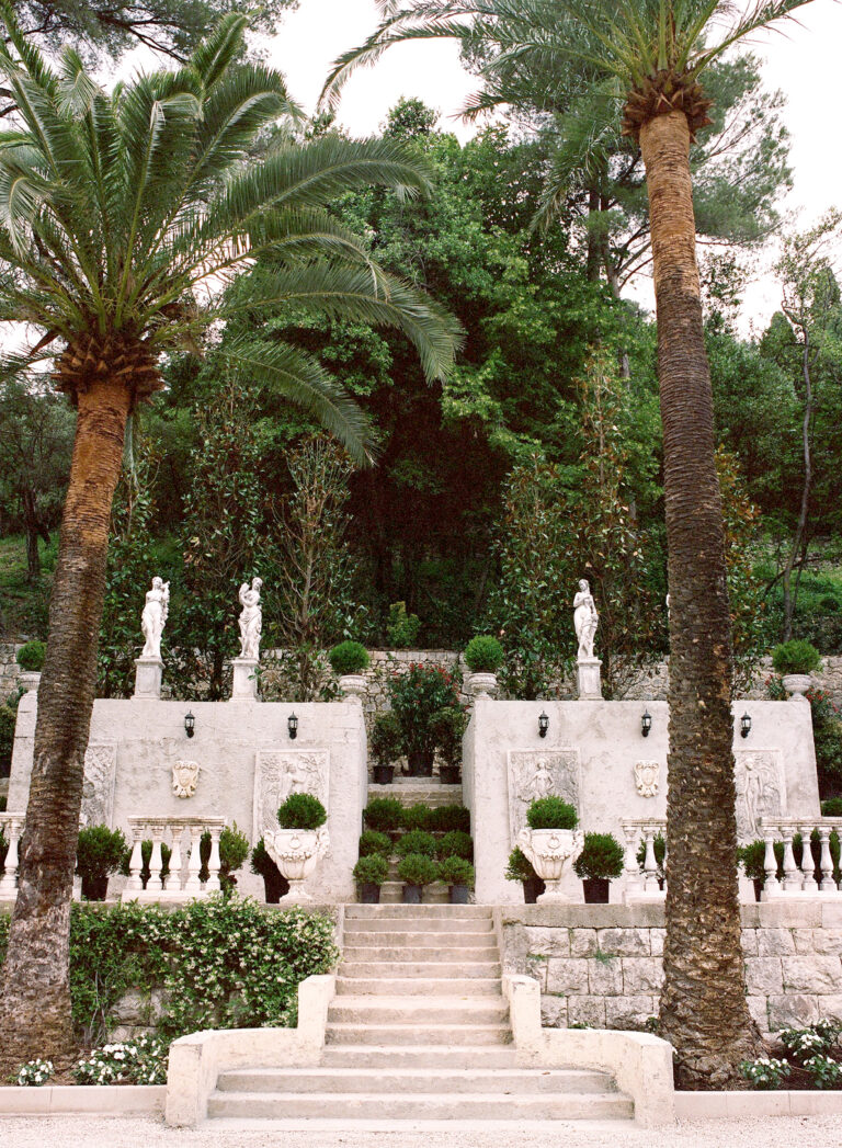 The terraced garden with statues and palm trees, Chateau Saint Georges