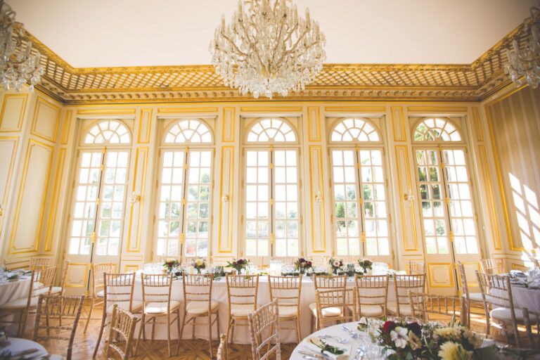 Long banquet tables in the gilded salon, Chateau Saint Georges