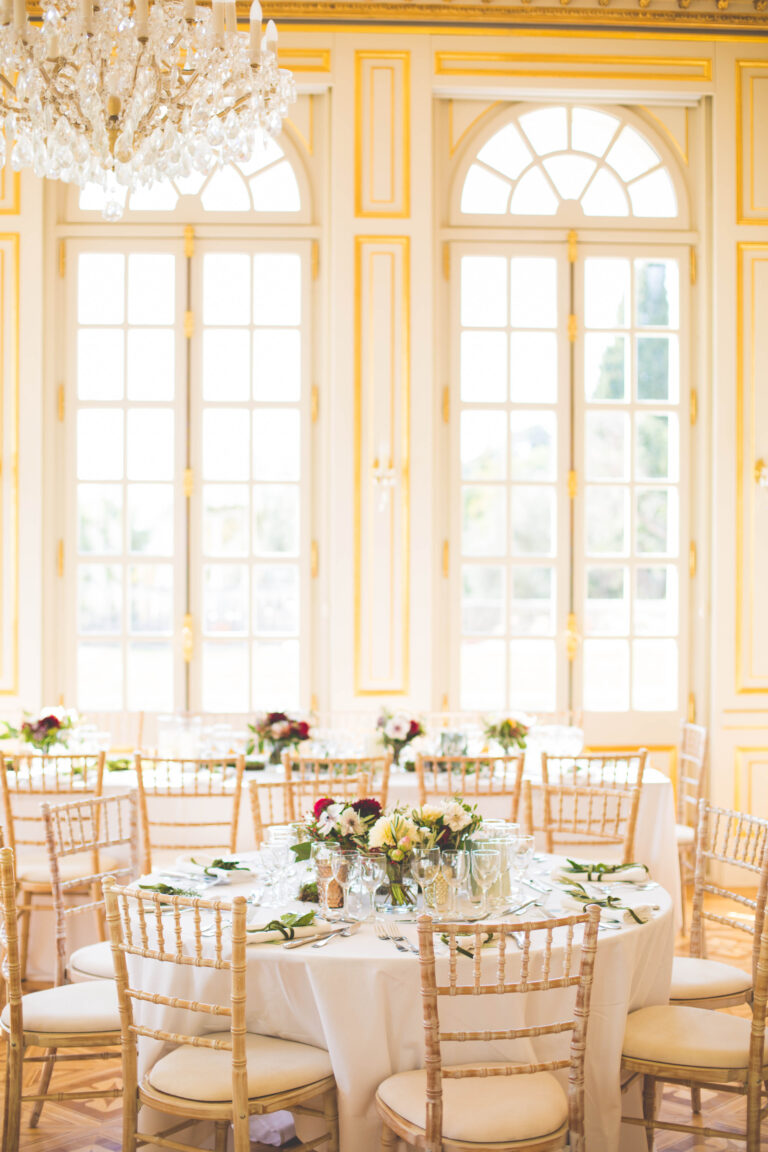 Round tables laid beside the tall salon windows, Chateau Saint Georges