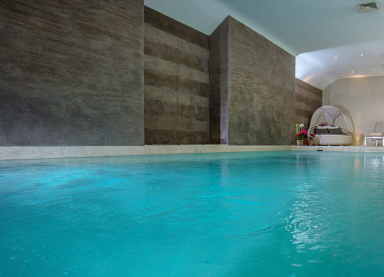 Indoor pool with a stone wall, Chedington Grange