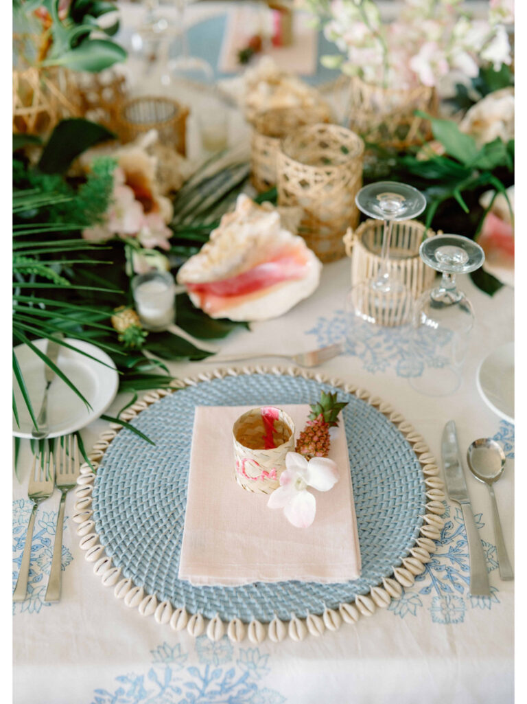Place setting with woven charger, shells and tropical foliage, Chic Bahamas Weddings