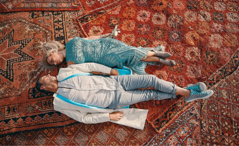 Couple resting on a Berber rug, Cocoon Events