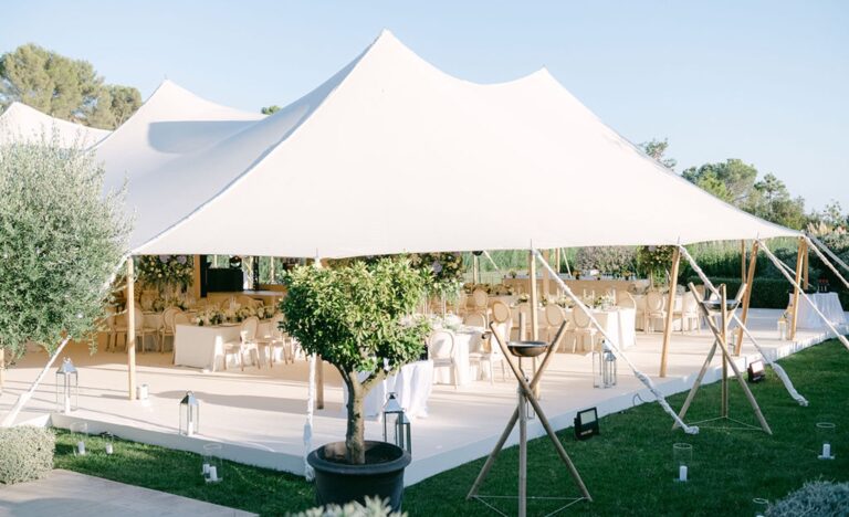 White marquee set among olive trees, Cocoon Events