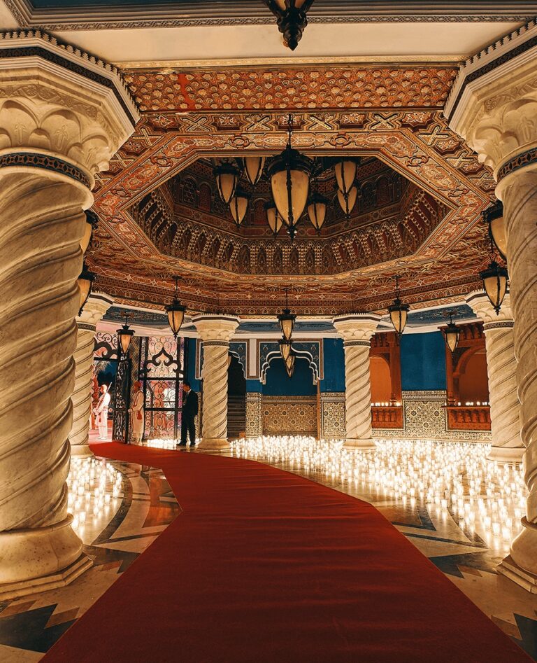 Lantern-lit carpeted corridor in a Moroccan hall, Cocoon Events