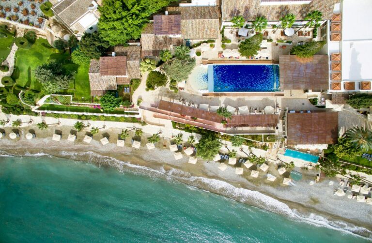 Aerial view of the east wing and the beach, Columbia Beach Resort