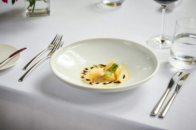 A plated dish on white linen, Columbia Beach Resort