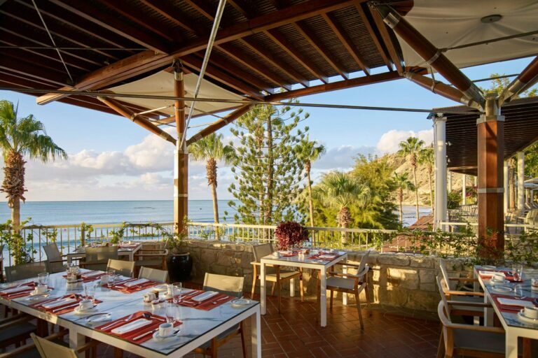 Cape Aspro terrace tables with sea views, Columbia Beach Resort