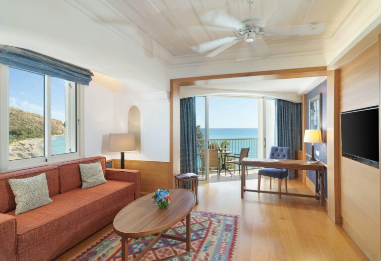 Cape Suite living area and balcony, Columbia Beach Resort