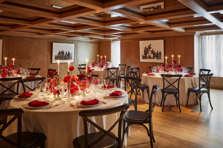 Round tables laid for a dinner in the Maple Room, The Connaught