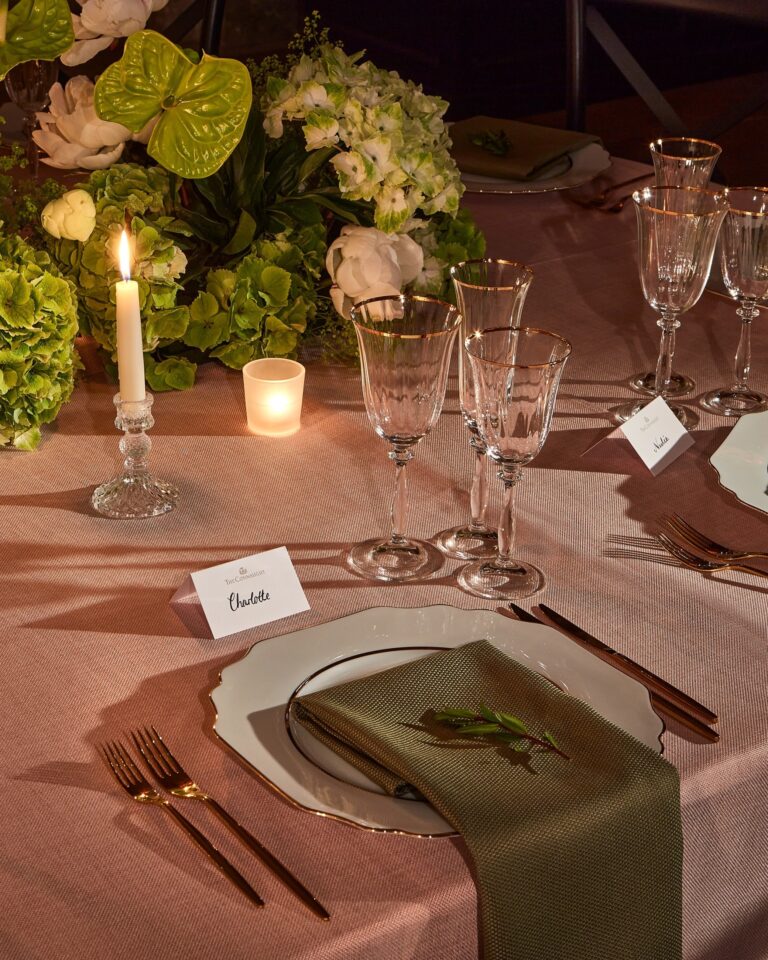 Table setting with flowers and candlelight, The Connaught