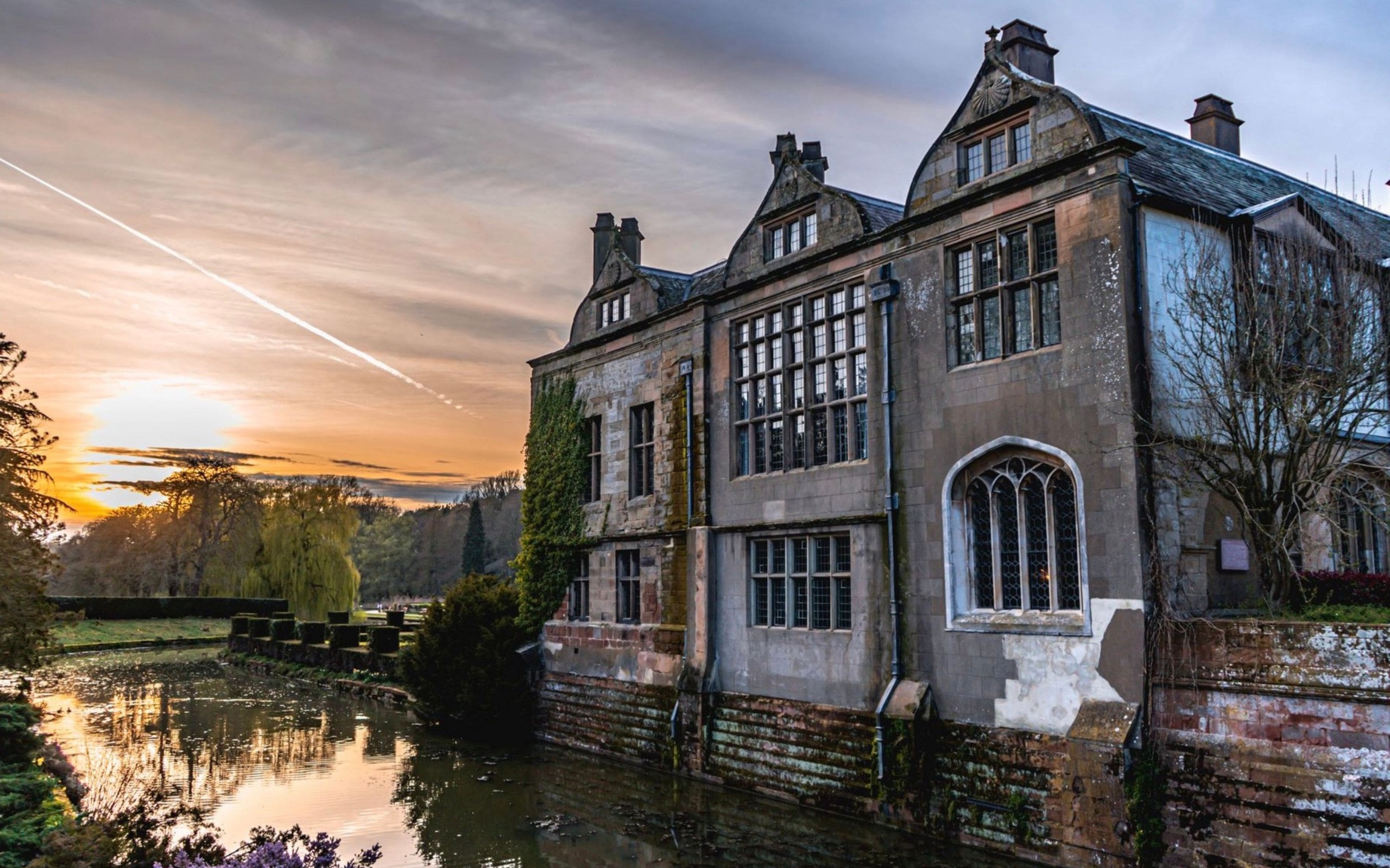 Coombe Abbey beside its moat at sunset, Coombe Abbey
