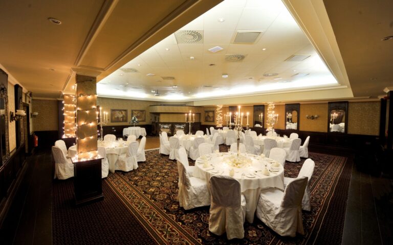The ballroom set with round tables, Coombe Abbey