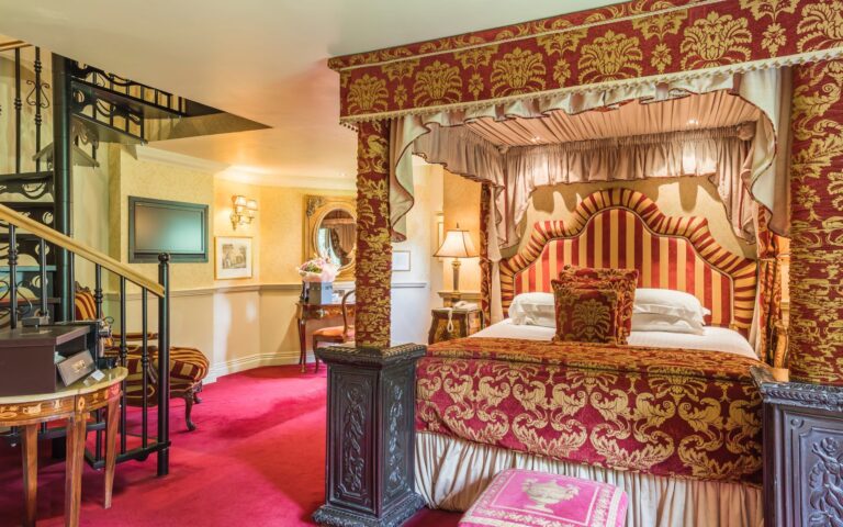 A four-poster bed in a bedchamber, Coombe Abbey