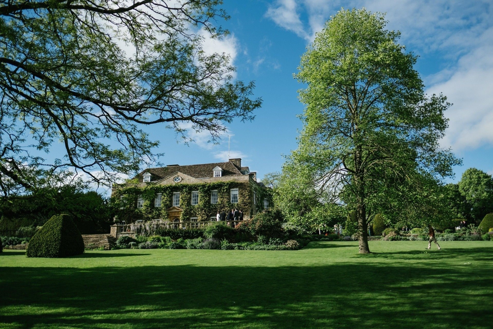 The manor across the lawn on its private estate, Cornwell Manor