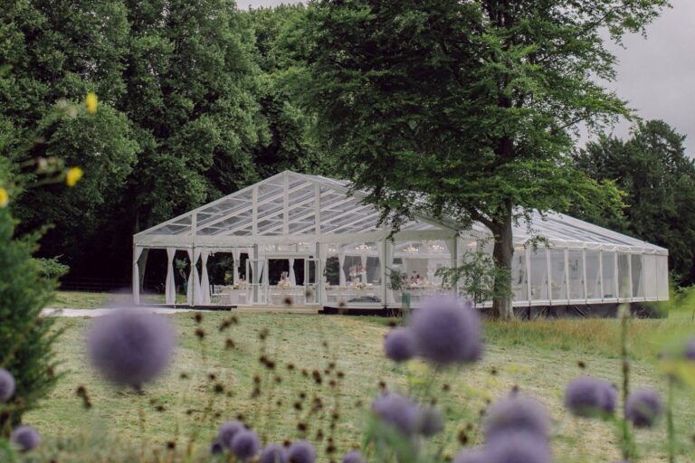 A clear marquee among the garden planting, Cornwell Manor