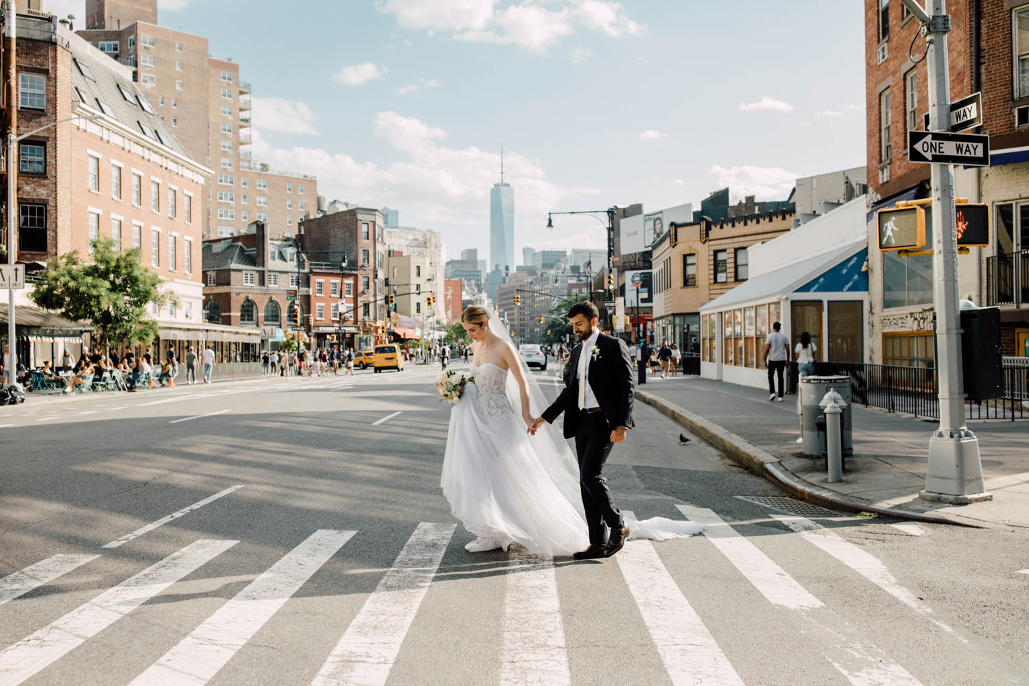 Bride and groom crossing a Manhattan street, from a French couple's wedding in New York (2026), Cottonwood Studios
