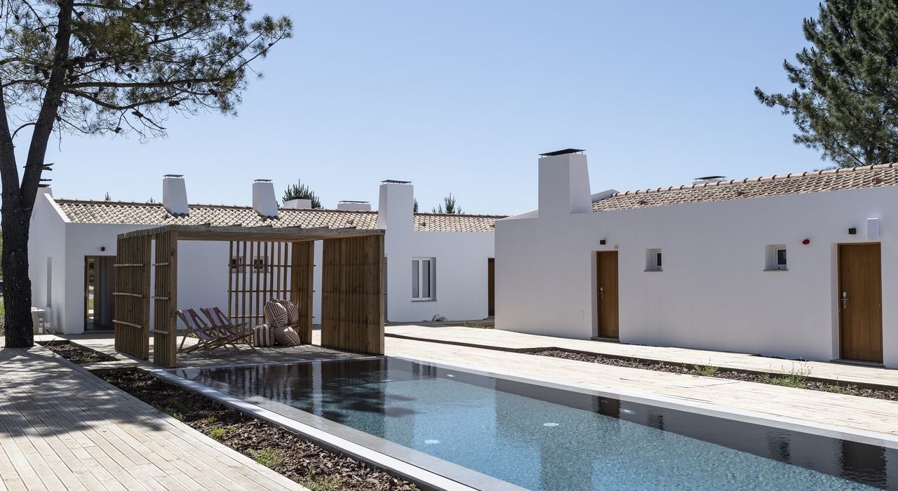 Pool and pergola between the houses, Craveiral Farmhouse